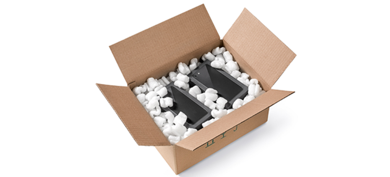
		  A cardboard box containing porcelain vases and S-shaped bioplastic packaging chips